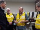 (L-R) Washington Gov Jay Inslee, ARES DEC George Boswell, K7YHB; ACS Radio Officer Scott Honaker, N7SS, and former ACS Radio Officer Tim Lawson, K7TKA. [Rob Myers, K7RHM, photo].